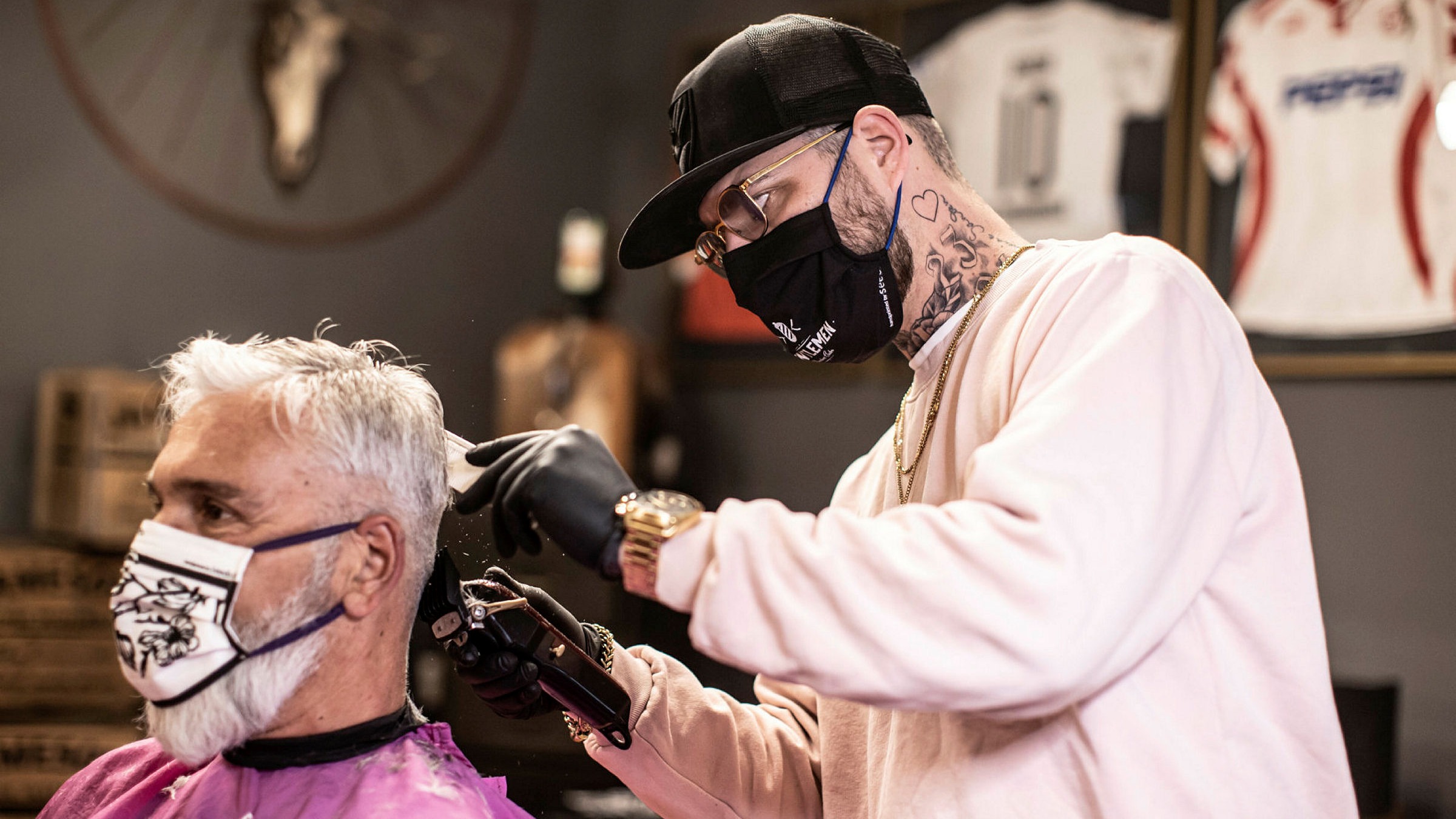 Eurozone business activity rebounds from pandemic hit 2 A barber shop in Cologne after lockdown was lifted. Germany’s services sector reported an increase in activity in July