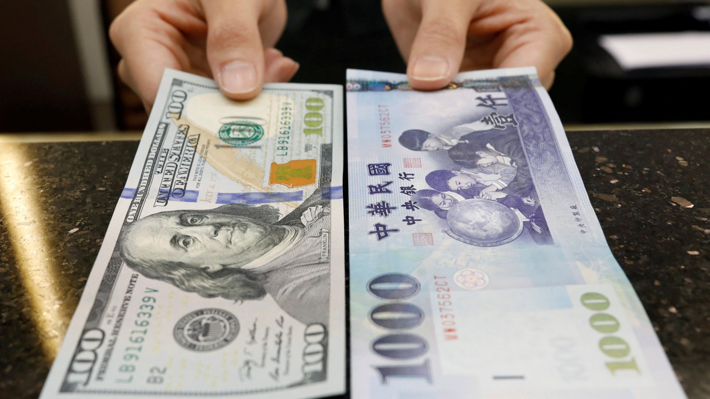 ft.com - William Sandlund - Taiwan's currency jumps as life insurers rush to hedge against weak US dollar